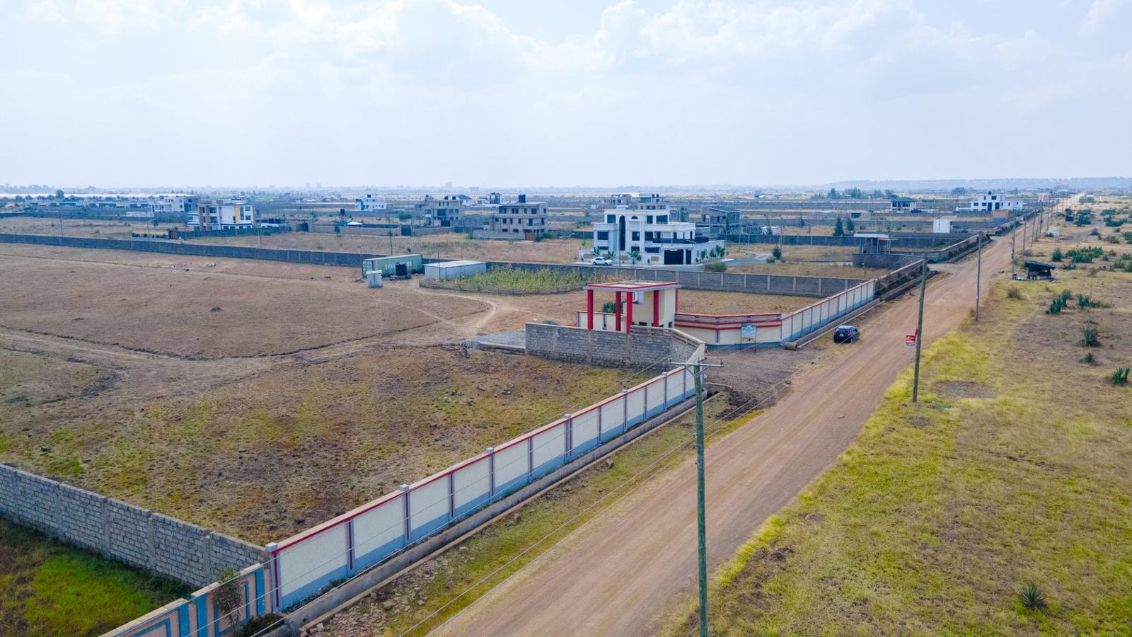 Completed Perimeter Wall & Access Road